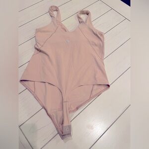 Lululemon bodysuit- size unknown! Estimate s/m or size 6